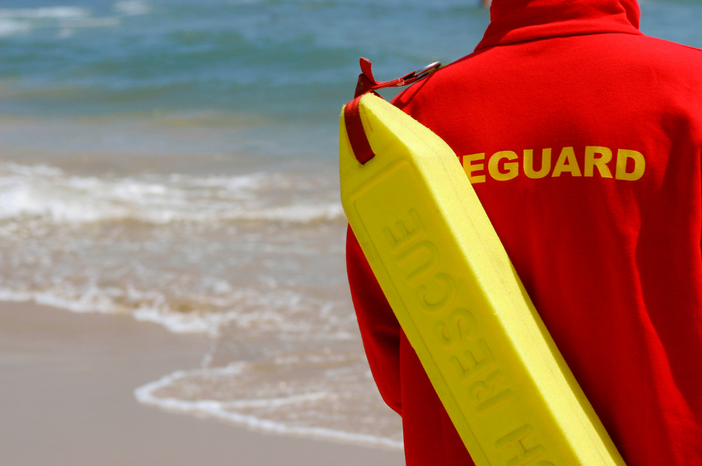 Life guard standing on beach