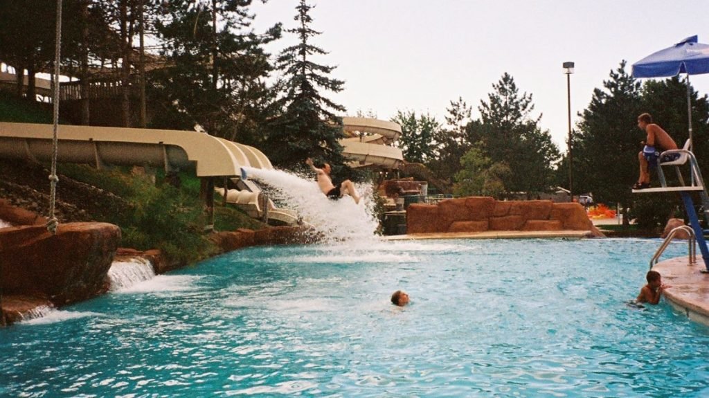 people in pool at waterpark